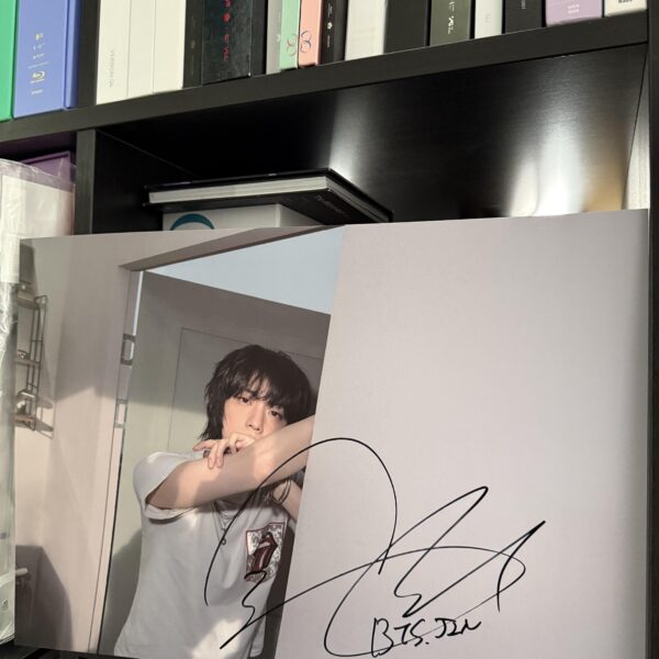 JIN ECHO AUTOGRAPHED POSTER and what have you won before?