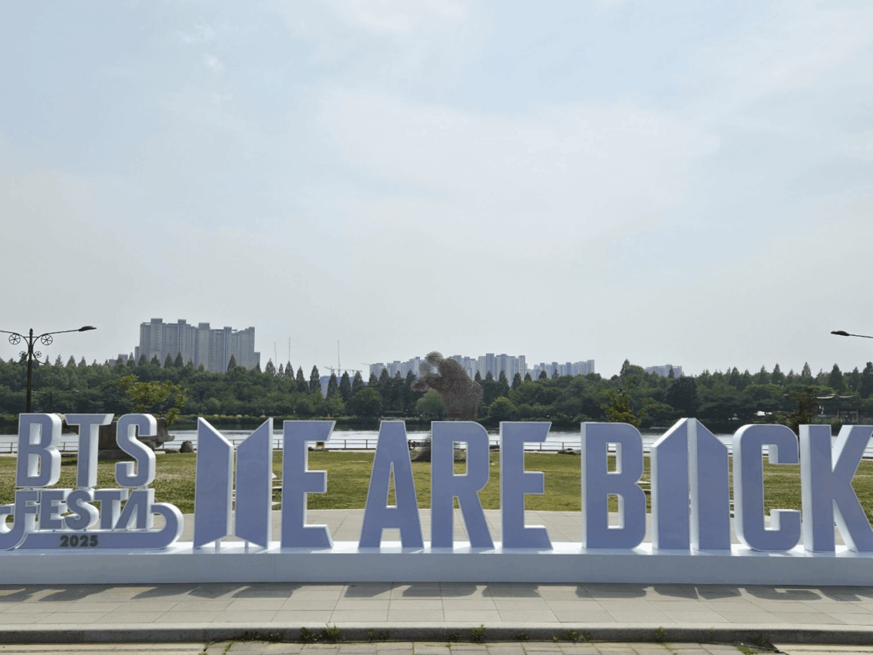 A "BTS FESTA 2025 WE ARE BACK" sign has been put up near KINTEX Hall for 2025 BTS FESTA