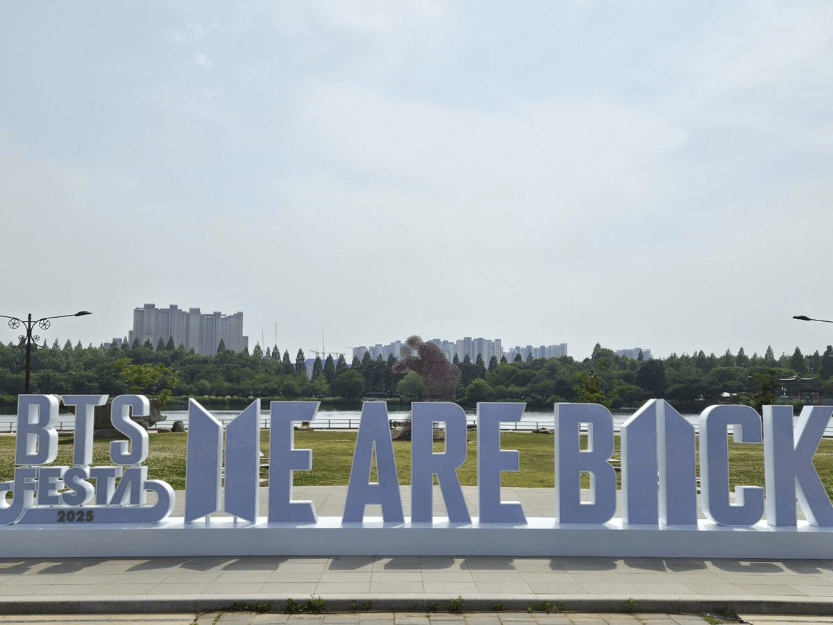 A "BTS FESTA 2025 WE ARE BACK" sign has been put up near KINTEX Hall for 2025 BTS FESTA
