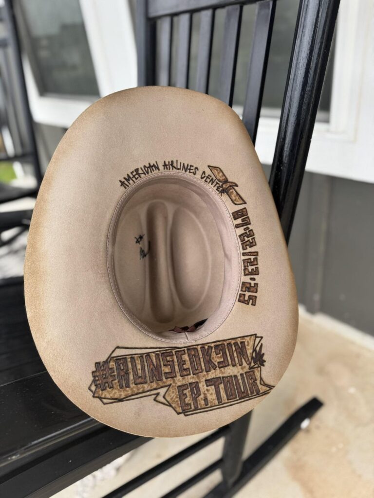 [American Airlines Center Twitter] Cowboy hat as Jin’s gift for night one- custom designed by Turquoise Desperada Hatworks - 220725