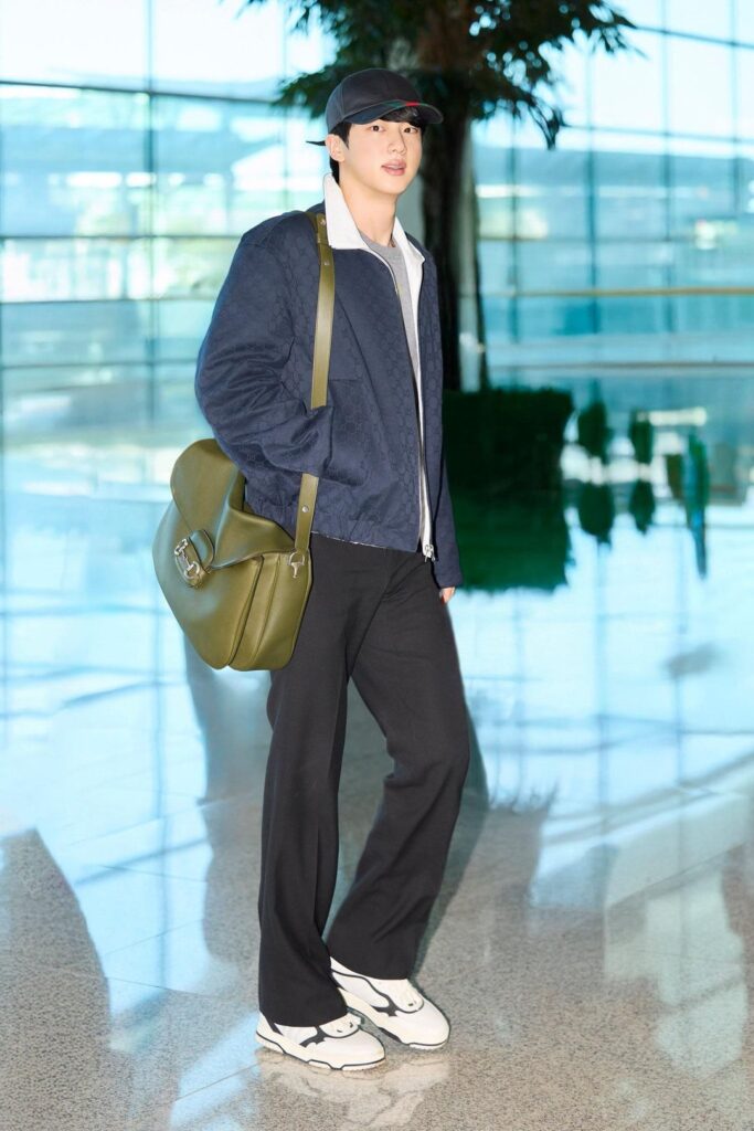 [Gucci Twitter] Heading to Milan for a special Gucci event, Global Brand Ambassador Jin from is seen in a Gucci look with the new Horsebit 1955 Aura bag. - 210925
