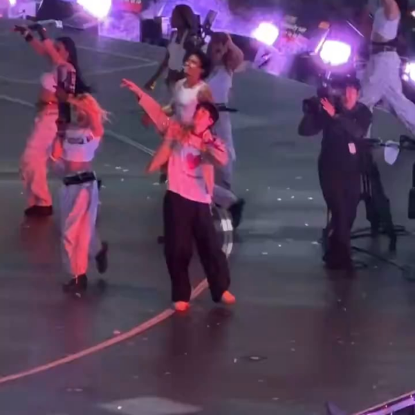 ARMY notices Jin having a dance battle with a backup dancer